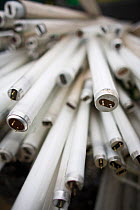 Close up of fluorescent light tubes at a recycling centre, Stroud, Gloucestershire, UK, February 2008.