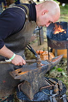 Blacksmith working at the Cotswold Farm Show, Cirencester, UK, July 2008.