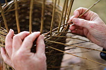 Close up of traditional basket weaving at the Cotswold Farm Show, Cirencester, UK, July 2008.