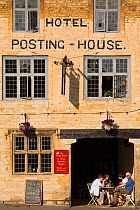 Close up of Hotel and old Posting House on Market Square and Market Cross, Stow-on-the-Wold, July 2008.