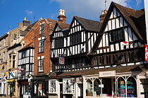 Buildings from different periods including timber-frame houses in Tewkesbury town centre, Gloucestershire, UK, July 2008.