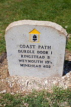 South West Coast Path National Trail waymarker information sign, near Durdle Door, Dorset, UK, May 2009.