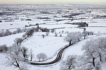 Winter view from Coaley Peak towards the Severn Vale on the Cotswolds escarpment, Gloucestershire, UK, January 2010.