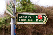The Tarka Trail cycle path and Coast Path information sign, Devon, UK, March 2010.