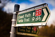 The Tarka Trail cycle path and Coast Path information sign, Devon, UK, March 2010.