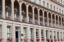 Floral displays - window boxes and hanging baskets - outside the Municipal Offices, The Promenade, Cheltenham, Gloucestershire, UK, July 2011.