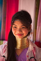 Long necked young woman with many neck rings, belonging to Padaung Tribe, Thailand