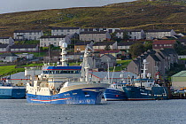 Pelagic trawler 'Adenia' leaving port, Lerwick, Shetland Islands, Scotland, UK, October 2011
