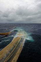 Pelagic trawler 'Charisma' hauling its net in, Shetland Isles, Scotland, UK, October 2011