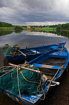 Boats and nets at the Paxton House netting station, pulled up on the banks of the River Tweed, Berwickshire, Scotland, UK, August