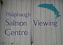 Signs on the doors of the Philiphaugh Salmon Viewing Centre near Selkirk on the River Ettrick Water, part of the catchment of the River Tweed, Selkirkshire, Scotland, UK, October 2011