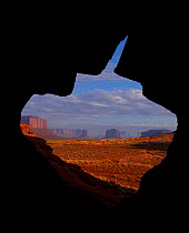 Monument Valley as seen through a hole in 'Submarine Rock'. Arizona, September 2011.