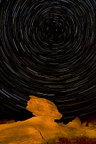 Long-exposure night photography reveals the rotation of the Earth, producing star trails centred on the Northern Circumpolar Star, Polaris. Toadstool State Park, Nebraska.