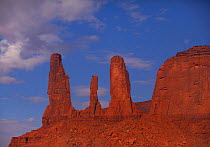 The 'Three Sisters' sandstone rock formations in morning light. Monument Valley, Arizona, September 2011.