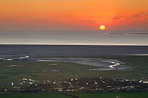Sunset over Morecambe Bay, seen from Warton Crag, Lancashire, England, UK, February