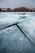 Fjord ice cracking open, Sabine Bay on Nordaustlandet, Svalbard, Norway, August