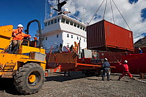Project coordinator Tony Martin offloading cargo (rat bait) from Fisheries Protection Vessel (Pharos) at King Edward Point, South Georgia Heritage Trust Rat Eradication Project, South Georgia, Februar...
