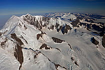 Aerial view of Mount Paget (highest mountain on South Georgia, 9565 feet, 2934m) with Allardyce Mountain Range, South Georgia, March 2011