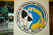 Sign for the conservation programme of the Blue throated / Wagler's macaw (Ara glaucogularis) a Critically endangered species from Trinidad, Beni, Bolivia, January 2008