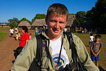 Biologist, Mauricio Herrera, arriving to join the conservation team studying and protecting the Critically Endangered Blue throated macaw (Ara glaucogularis) Coquinal, Beni, Bolivia, June 2008