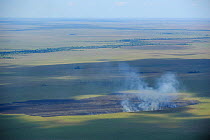 Savannah fire on the Llanos de Moxos, Estancia Tacuaral, Santa Ana del Yacuma, Beni, Bolivia, July 2008