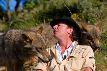 Daniel Weigend, owner of the Lobo Park, with Iberian Wolves (Canis lupus signatus). Antequera, Spain, January 2007.