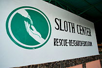 Sign outside the sloth sanctuary and research station.  Aviarios del Caribe Sloth Refuge, Costa Rica, 2008.