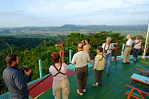 People watching birds from the Canopy Tower bird observatory. Canal rainforest, Panama City region, 2008.