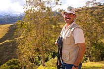 Gonzalo Cardona Molina, coordinator of the Andean Parrot Project, in wax palm (Ceroxylon quindiuense) highlands of Tolima. Colombia, 2010.