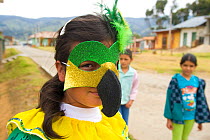Child in parrot show costumes. Roncesvalles, Tolima, Colombia, 2010.