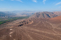 Valley, desert and mountains, with the 'Nazca Lines' visible. These are lines and patterns made around 300-600 AD by removing stones from the desert floor to expose the ground beneath. Their purpose r...