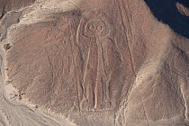 The 'astronaut' or 'giant', one of the patterns of the Nazca Lines. These are lines and patterns made around 300-600 AD by removing stones from the desert floor to expose the ground beneath. Their pur...