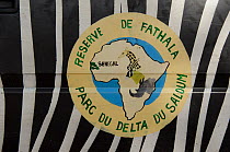 Sign and logo for Fathala Reserve. Toubacouta, Senegal.