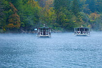 Two tourist boats on water, Plitvice Lakes National Park, Lika, Croatia, Europe, October 2011