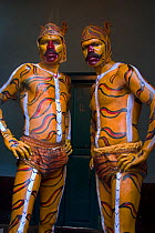 Two men painted as tigers. Huli Vesha, tiger dance, is a popular form of folk dance in many parts of Southwestern India. No release available.