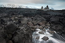 Londrangar surrounded by lava field, Snaefellsnes Peninsula, Iceland, February 2011