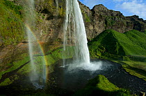 Seljalandsfoss waterfall, with rainbow in smaller stream of water, Iceland, June 2008