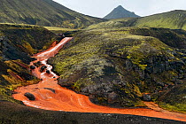 Raudufossakvisl, a red river flowing through the highlands with a mountain peak in the distance, Fjallabak Nature Reserve, Iceland, August 2010