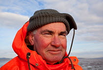 Portrait of a cockle fishermen, Morecambe Bay, Cumbria, England, UK, February 2012. Model released. 2020VISION Exhibition.