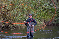 Angler casting into the River Teviot, Dumfries and Galloway, Scotland, UK. Model Released. 2020VISION Exhibition. 2020Vision Book Plate.