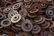 Close up of large pile of old disc brakes, Recycling Center, Ithaca, New York, USA, property released.