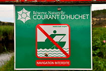 No boating allowed sign along the river between Leon pond and Atlantic ocean, Courant D'Huchet Landes, France, August 2010.