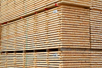 Sawn and processed timber stacked in BSW sawmill, Boat of Garten, Inverness-shire, Scotland, UK, February 2012.