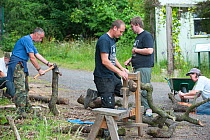 Volunteers working on wood at the Birmingham EcoPark, a Black Country Living Wildlife Trust education centre in Small Heath, West Midlands, July 2011