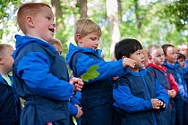 Children from Rowley View Nursery School exploring nature at the Moorcroft Environmental Centre Forest School, Moorcroft Wood, Moxley, Walsall, West Midlands, July 2011.