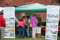 Visitors and environmental experts attend the Black Country Living Wildlife Roadshow, Sandwell Park Farm, West Bromwich, West Midlands, August 2011