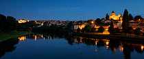 Pont-du-Chateau viewed from across the river Allier at night, Auvergne, France, August 2010