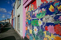 Community art in urban street depicting wildlife to brighten up street, Western street, Swansea, Wales, UK 2009