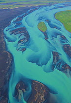 Aerial view of Olfusa river and estuary with blue water of melting glaciers, Southeast Iceland, July 2009