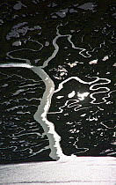 Aerial view of sun reflected on the Odiel marshes, Huelva, Andalucia, Spain, March 2008